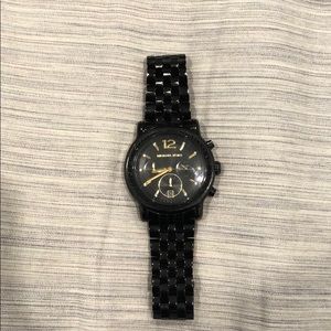 Women’s all black Michael Kors watch